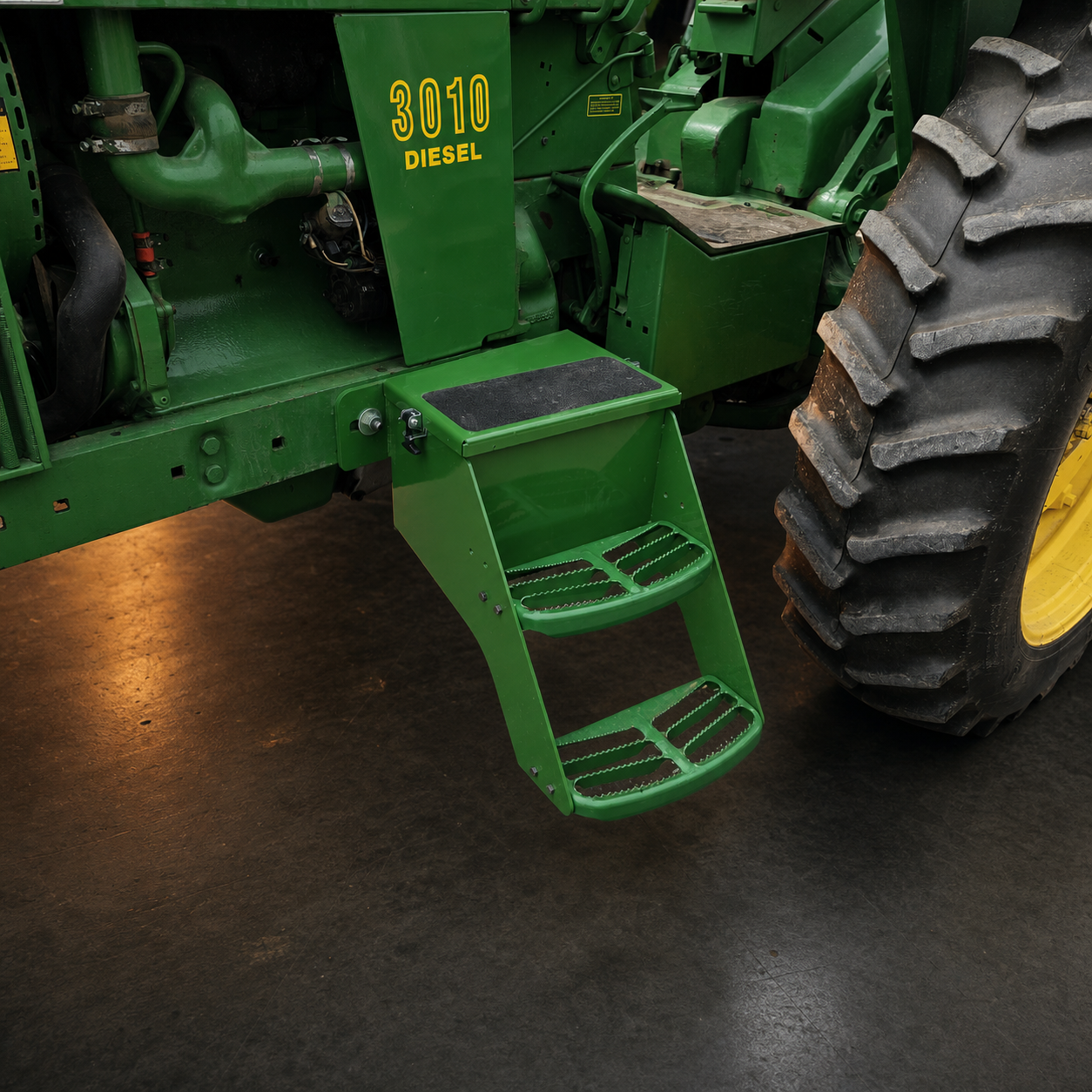P-Fab battery box step installed on a John Deere tractor